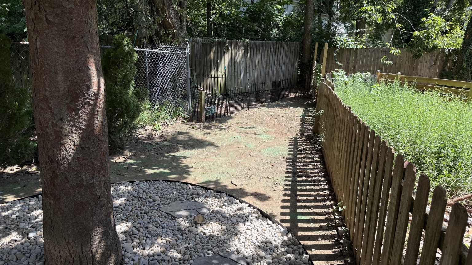 Completed river rock landscape bed